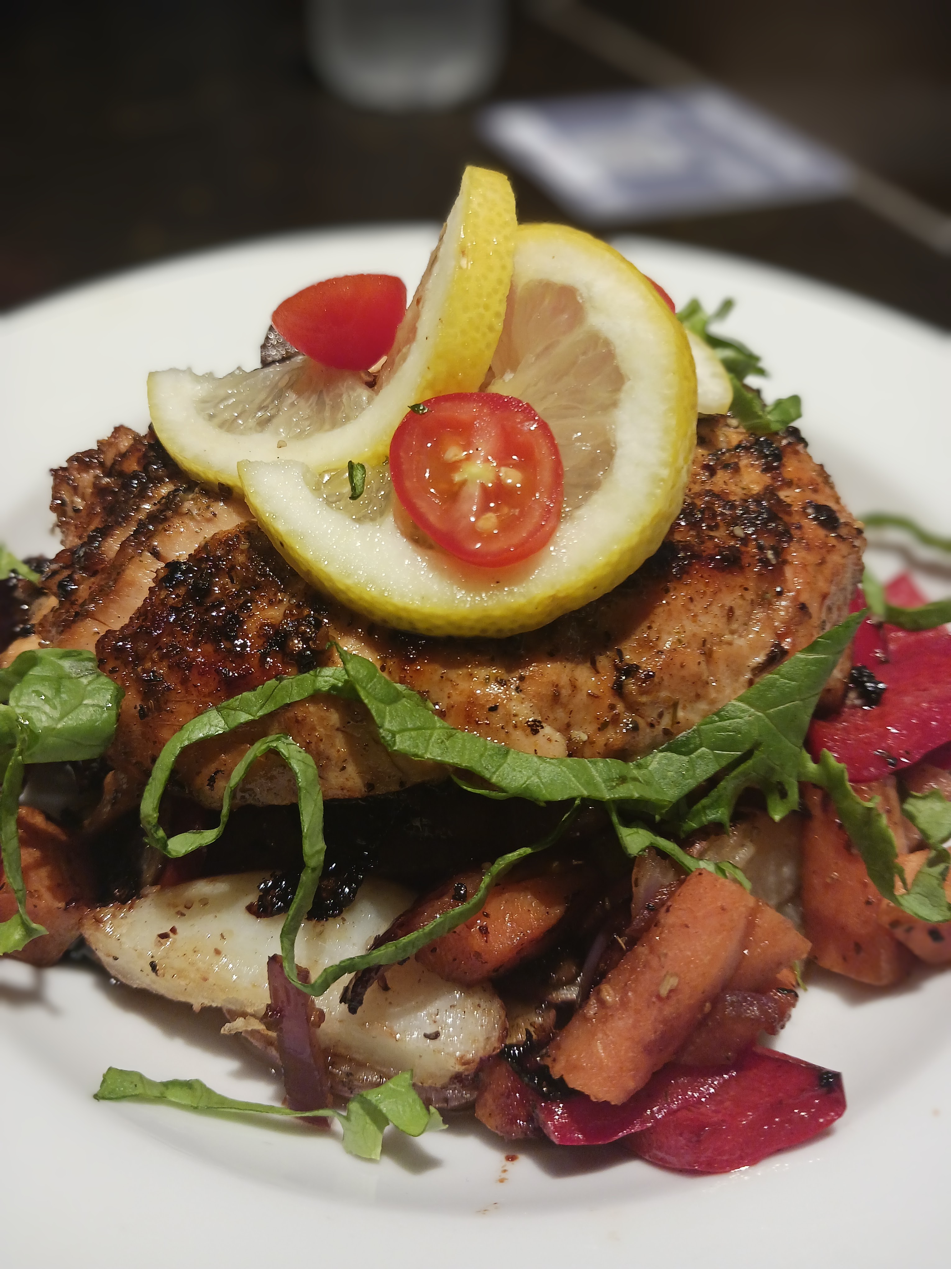 Seared tuna with citrus garnish and roasted root vegetables